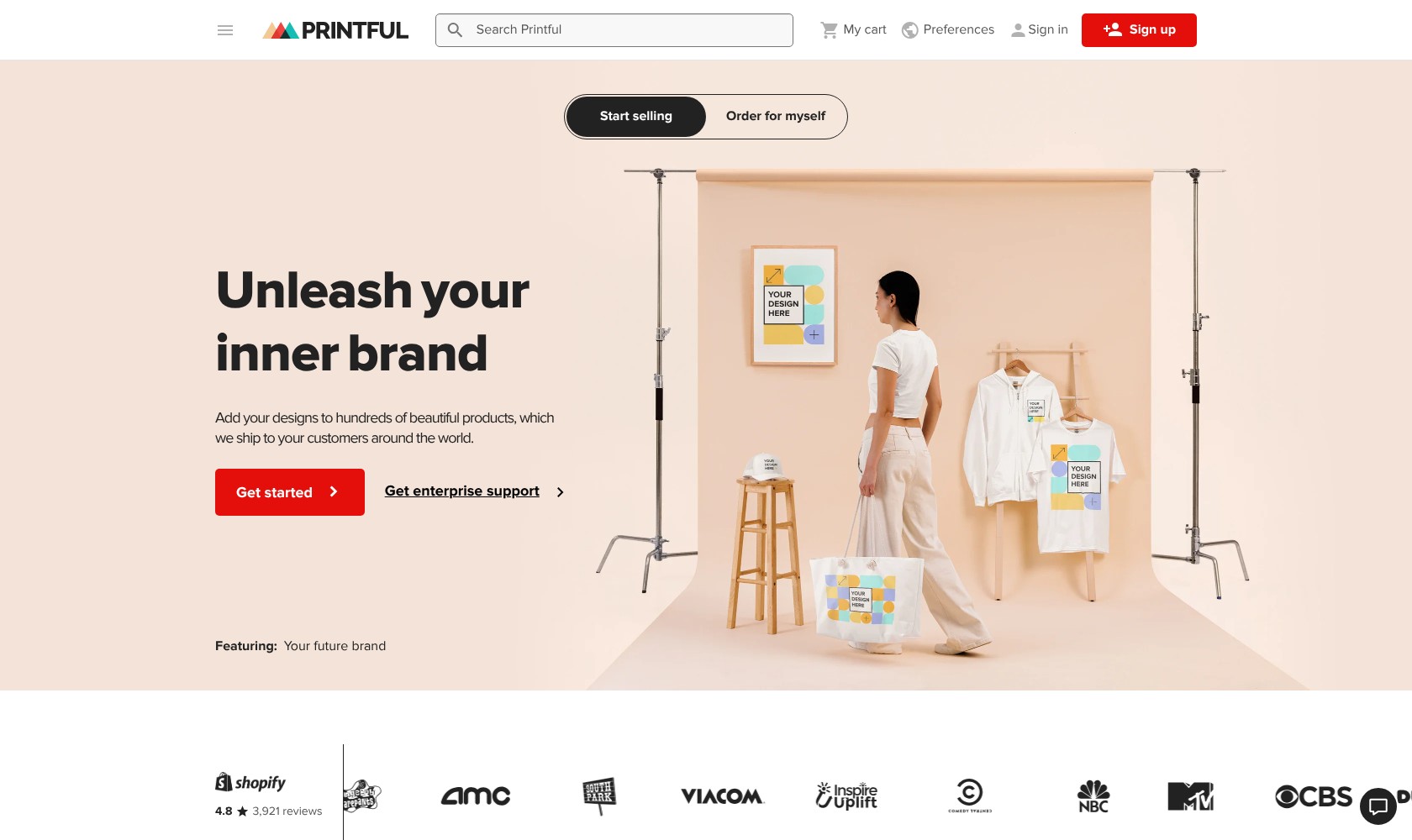 Printful homepage showing custom clothing and print-on-demand products